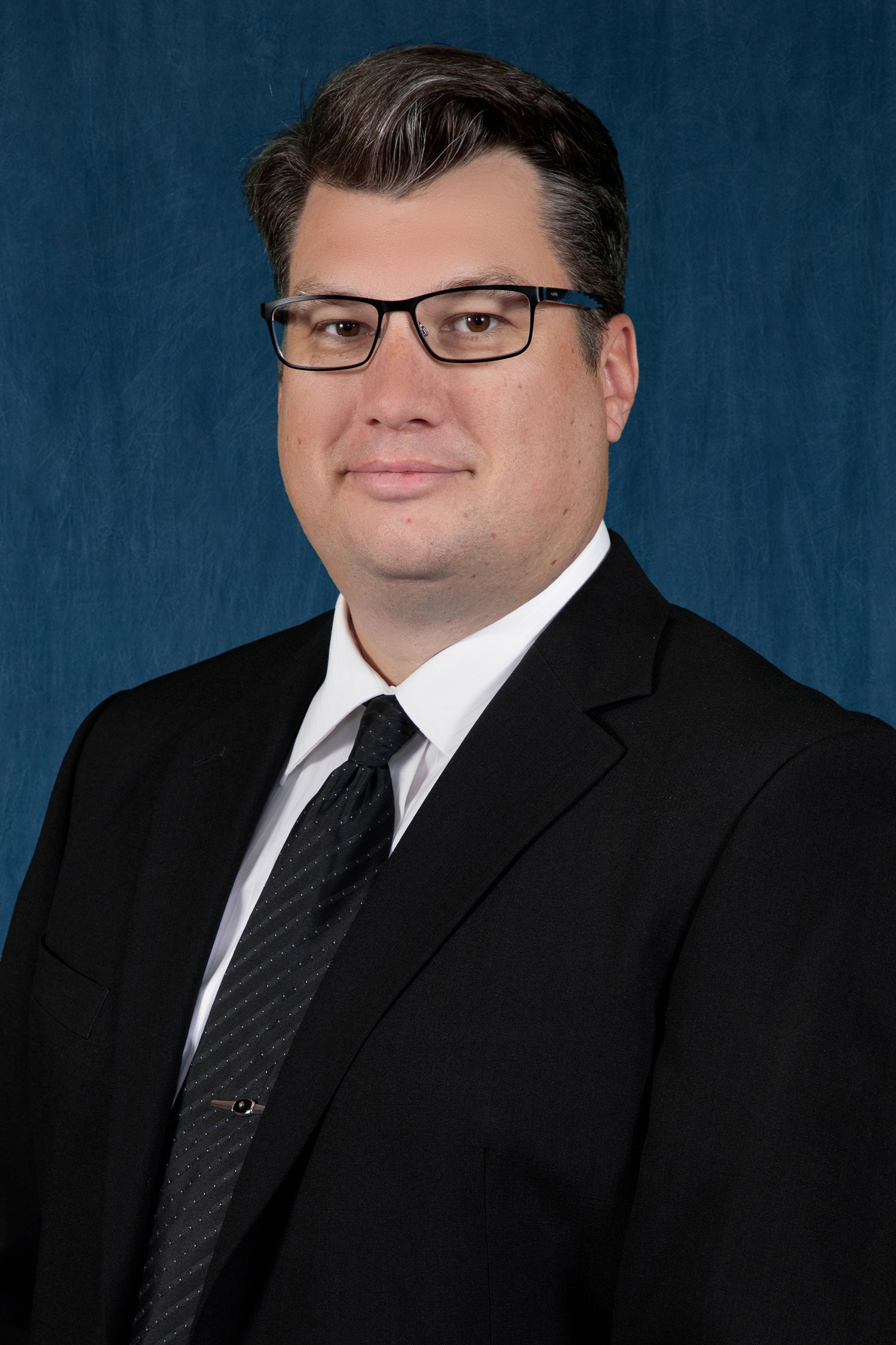 Headshot of Ryan Roupe